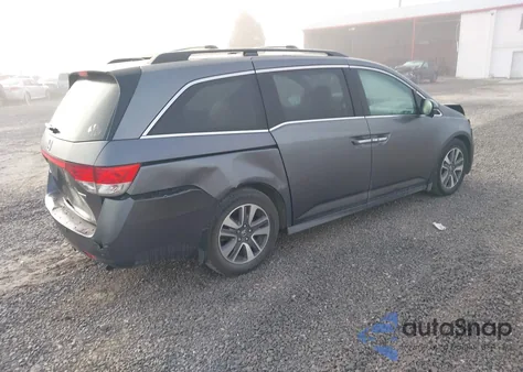 2014 Honda Odyssey Touring/Touring Elite из США, поврежденный, VIN 5FNRL5H9XEB130424